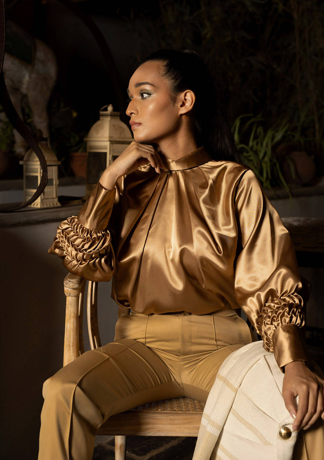 Gold blouse with smocked balloon sleeves
